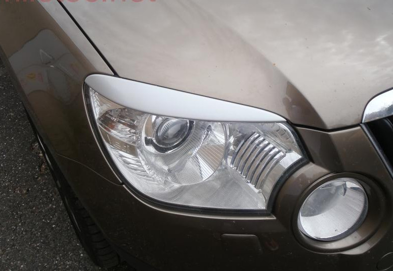 86815 Накладки фар сріблясті